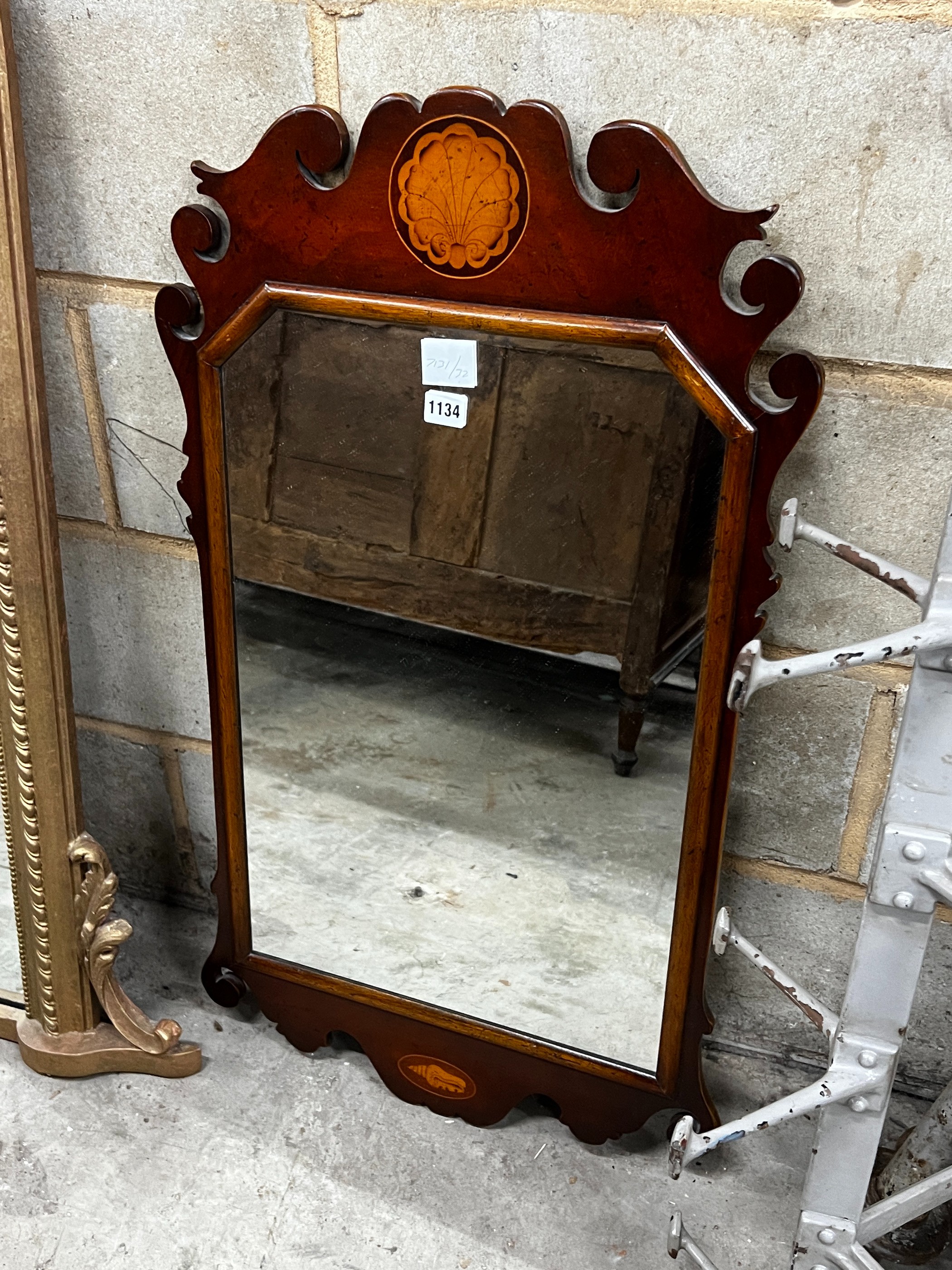 A George III style mahogany fret cut wall mirror, width 52cm, height 90cm